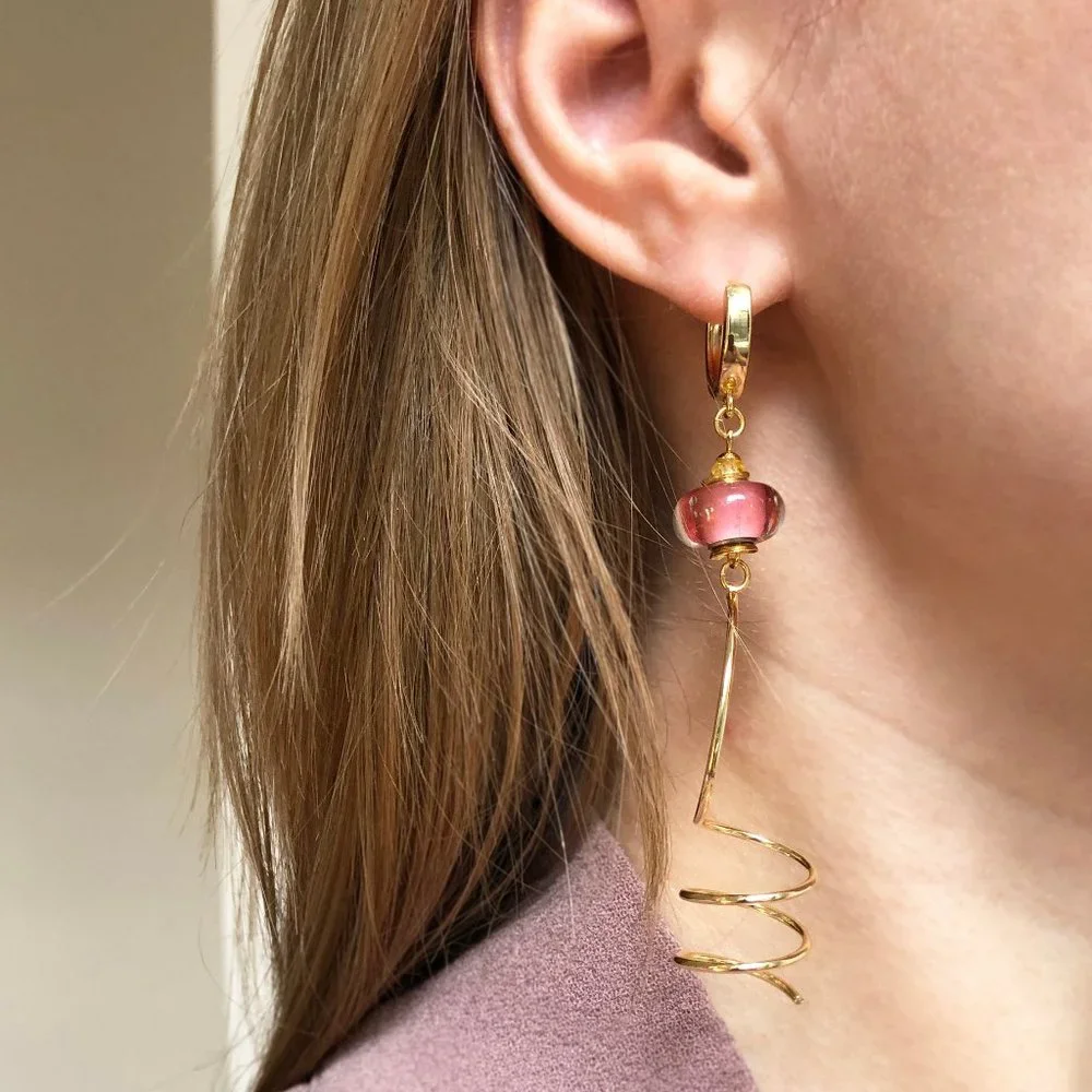 Unmatched earrings dangle, large spiral earrings gold tone